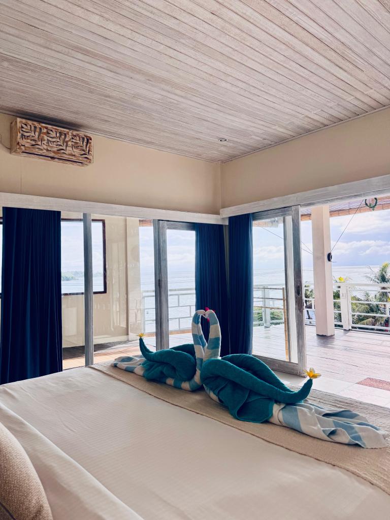 Wide shot of ocean room two and exterior 