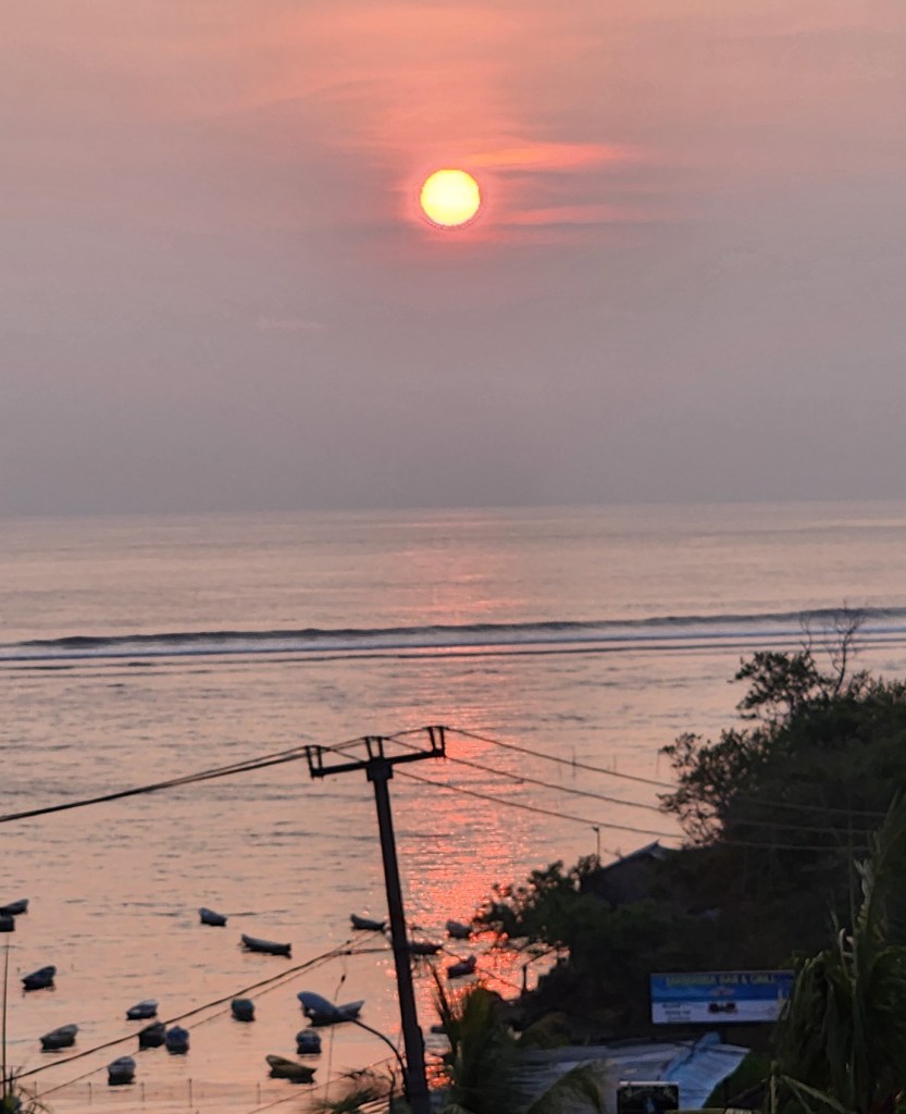 Orange sunset view from Nusa View and Hakuna Matata