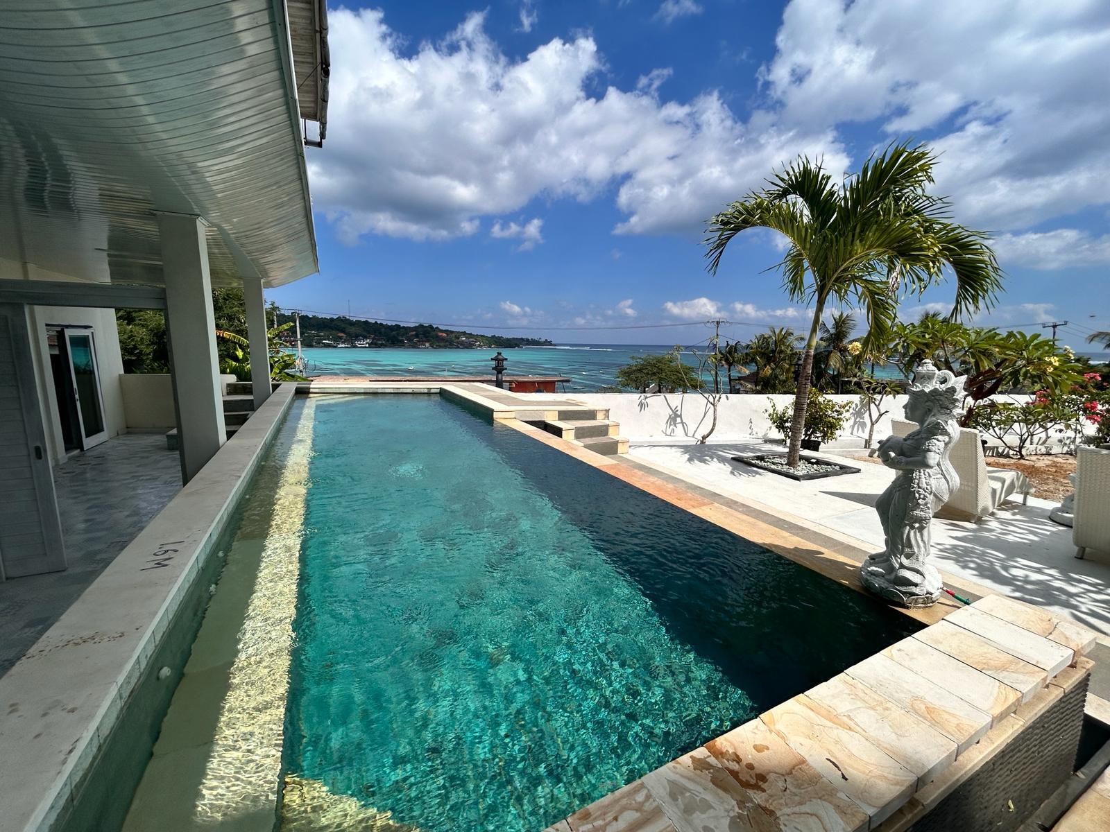 Wide shot of the pool in front of the Family Room